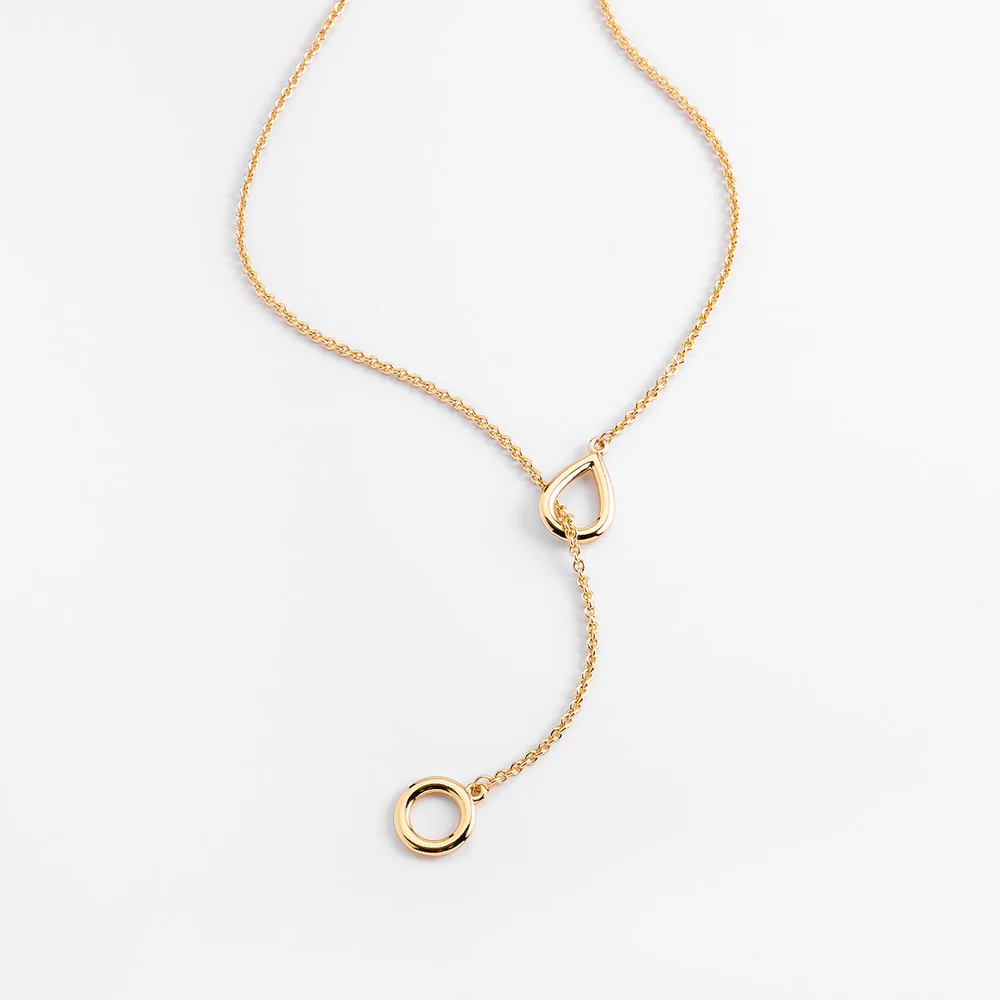Collar con dije lágrima y círculo calado